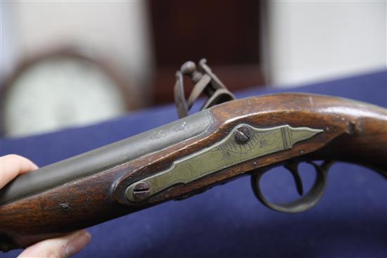 A pair of early 19th century flintlock holster pistols, signed Weston, Lewes, 15in.